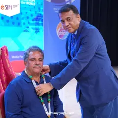 We are incredibly proud to celebrate Mr. Chandrashekar, our Chandru Sir, being honored by the Rotary International District. Here he is being felicitated for his outstanding contribution to promoting yoga internationally.