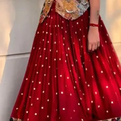 A closer look at the flared red georgette skirt from the Kalamkari print set. You can see the delicate sequin work and the printed border that complements the unique blouse.