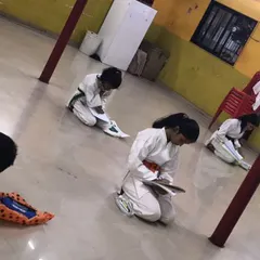 Progress in karate is not just physical. Our students are taking their theory exam, a written test that covers history, etiquette, and technique. This ensures a complete understanding of the art form.