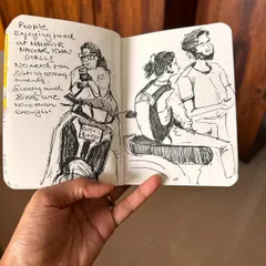 A page from my sketchbook capturing the scene at Mahavir Nagar's khau galli. I love observing people enjoying street food, using their scooters as makeshift tables. These simple, real moments are what inspire my art.
