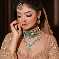 A close up shot focusing on the flawless eye makeup and glowing skin. I teach techniques like cut crease and blending to create depth and elegance, essential skills for any professional makeup artist.