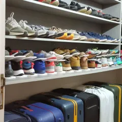 The same shoe closet, but this time using shoe slots to double the storage capacity. This is a great trick for anyone with a large shoe collection.