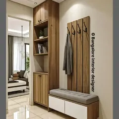 A complete entryway solution with a tall storage cabinet, coat hooks, and a bench with built-in shoe storage. The combination of wood and white finishes gives it a clean, modern look.