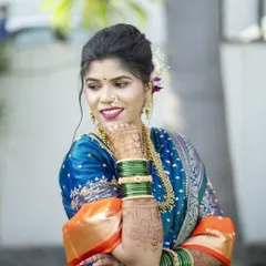 A playful and coy bridal portrait, capturing a moment of happy contemplation.
