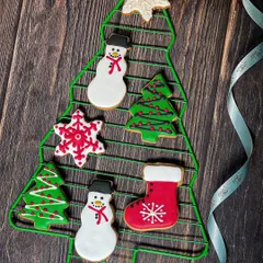 A beautiful assortment of my hand-decorated Christmas cookies. These are perfect for gifting or adding a sweet touch to your holiday dessert table.