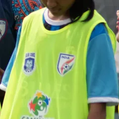A close-up of the logos on our training bibs, including AIFF, AFC Grassroots Football, and Blue Cubs, representing our commitment to grassroots development.