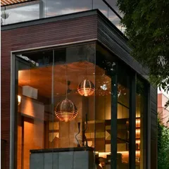 A glass-encased study that cantilevers over the garden. This 'room with a view' is a perfect example of how we create intimate spaces for contemplation that remain deeply connected to the nature outside.