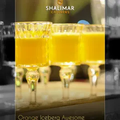 Our Orange Iceberg Awesome is your lipsmacking refreshment. Served in elegant, long-stemmed glasses, this bright and cheerful drink is as tasty as it is beautiful.