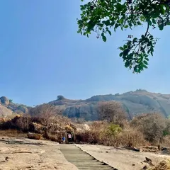 The rocky landscape of Uttari Betta. The trail is unique, with steps carved into the rock and a fort at the top.