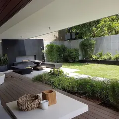 This project was about creating a functional and stylish outdoor living room. I designed a space with a wooden deck, a modern fireplace feature, and a clean lawn area, all surrounded by carefully selected plants for privacy and ambiance.