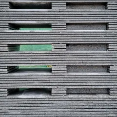 The finished mock-up of the granite screen shows the pattern of voids and solids. This hands-on testing is a core part of our design process for creating unique architectural and furniture elements.
