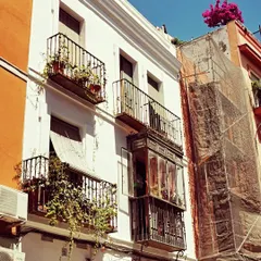 The intricate balconies and sun-bleached walls of this building in Andalusia are details that I carry with me. This connection to the land of Flamenco is something I share with my students, helping them understand the culture from which the dance originates.