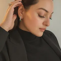 A profile of elegance, Sonakshi Sinha wears my diamond and gemstone earrings. This image captures a quiet moment of glamour and highlights the versatility of my pieces.