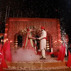 A moment of pure magic. I designed this opulent red and gold mandap to feel both royal and deeply romantic, with perfectly timed pyrotechnics to celebrate the couple's union under the stars.