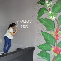 Bringing the coffee vibe to a new branch of Mysuru Kaapi. This mural shows the coffee plant from blossom to berry, a perfect theme for a place that celebrates authentic filter coffee.