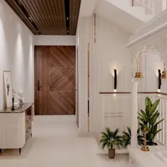 This angle shows the mandir in the context of the hallway, highlighting the seamless integration with the home's overall design. The wooden ceiling and doors provide a warm contrast to the white mandir.