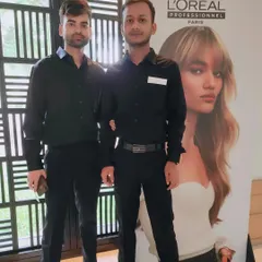 With a colleague at the L'Oreal training event. We share our passion for hairstyling and learning from the best in the business.