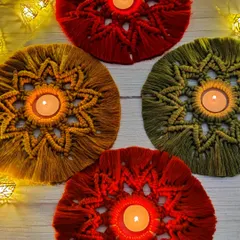 These star-patterned macrame tea light holders are perfect for Diwali. They create a beautiful, warm glow and can also be used as a no-fuss rangoli decoration.
