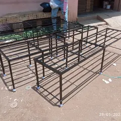Here you can see our stands in the fabrication stage. Each piece is hand-welded from high-quality mild steel right here in our Bengaluru workshop before being painted.