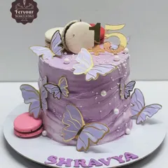 A beautiful lavender cake decorated with purple butterflies and macarons. This chocolate Nutella cake was customized for a client's special celebration.