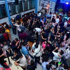 An aerial shot of the packed dance floor during a New Year's Eve party at Vapour. The energy was absolutely electric as we counted down to midnight.