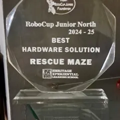 A close-up of the "Best Hardware Solution" trophy from the RoboCup Junior 2024-25 North competition. This award is a testament to our team's innovative approach to the Rescue Maze challenge.