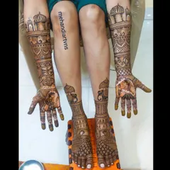 This full bridal set includes portraits, elephants, and palace-inspired domes on the arms, with complementary elephant and peacock designs on the feet.