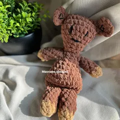 A tribute to a classic character, our handmade version of Mr. Bean's Teddy is crafted from soft, brown chunky yarn. We focused on getting his signature stitched eyes and limbs just right, creating a nostalgic and comforting companion for any fan of the show.