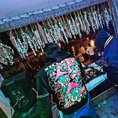 A shot from behind the decks during a techno event. This is the view I love, seeing the crowd connect with the deep, hypnotic grooves of a proper techno set.