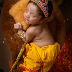 My favorite from the Krishna series. Baby Krishay, just a few days new, peacefully dreaming. This Krishna theme for newborns is a beautiful way to celebrate a divine beginning.