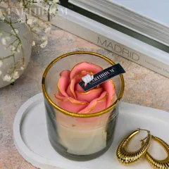 The same floral votive design, here in a soft pink. It’s a delicate and beautiful piece that adds a touch of warmth and gentle fragrance to your space.