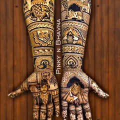 We teach you to tell stories on skin. This full bridal mehndi set features detailed portraits of the bride and groom, surrounded by traditional motifs like elephants and ghoonghat figures, creating a personal and unforgettable piece of art.