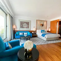 For the Intercontinental Mumbai, I designed this suite as a symphony of coastal elegance. The vibrant teal upholstery and bespoke furnishings are set against warm wood and natural light, creating a luxurious yet comfortable retreat that mirrors the spirit of the sea.