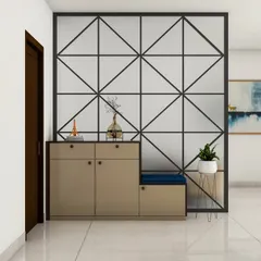 This foyer features a modern shoe cabinet with a seating nook, set against a geometric patterned partition. The design is both functional and serves as a beautiful decorative element.