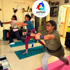 A group of women building strength together. This session focuses on dumbbell lunges, a fantastic exercise for lower body strength, which is crucial for bone density and metabolic health.
