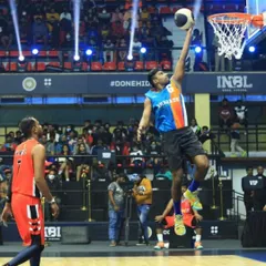 I don't just coach the game, I still play it at a high level. Here I am driving for a layup during the INBL 3x3 tournament. This is the kind of real-game experience and intensity I bring to my coaching.