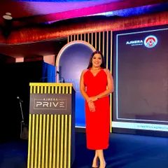 Ready to host "The Grand Welcome" for Ajmera Realty. I bring a touch of elegance and excitement to luxury real estate launches.