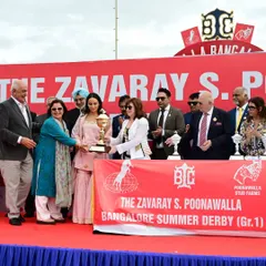 A moment of triumph at The Zavaray S. Poonawalla Bangalore Summer Derby. We celebrate the victory of Fynbos, with the cup presented by Mr. Zavaray S. Poonawalla, a name synonymous with Indian racing excellence.
