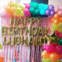 A close-up of the personalized "Happy Birthday Lubhani" foil balloons. I can customize the name for any celebration, making the person of honor feel extra special on their day.
