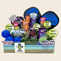 For the sibling who lives and breathes sports, our Pickleball-themed Rakhi hamper is a smash hit. It's packed with rackets, balls, protein bars, and an energy drink for the perfect game-set-match celebration.