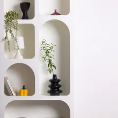 Here is another view of our arched shelving unit, offering a clean white canvas with plenty of negative space for creative compositions and graphic text overlays.
