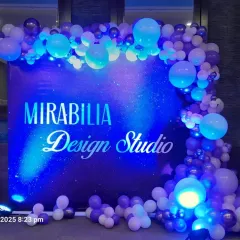 For a modern and dynamic look, I use LED screen backdrops like this one for Mirabilia Design Studio. The moving starry sky graphic, framed by a custom balloon arch, makes your brand launch or event truly unforgettable.