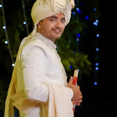 Another shot of the dapper groom. The focus is on clean, sharp styling to ensure he looks his absolute best.