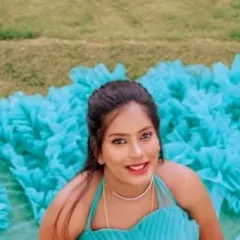 A happy client during her photoshoot. This close-up shows the radiant and joyful makeup look I created, focusing on bright lipstick and defined eyes.