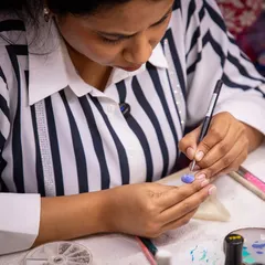 Close-up of fine line work in progress. Precise, steady hands are a skill we build through dedicated practice on foundational exercises like swirls and lines.