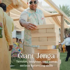 Giant Jenga is always a hit. It brings out laughter, a bit of friendly competition, and some serious balancing skills, making it a great icebreaker for guests.