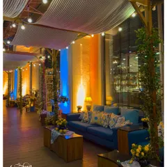 For this corporate dinner, I created a sophisticated Sicilian-themed lounge. The combination of draped ceilings, warm string lights, and carefully chosen furniture transformed an indoor space into a chic Mediterranean escape, perfect for networking.
