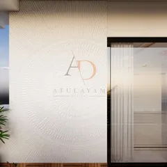 A feature wall on a balcony with an artistic textured sunburst pattern, adding a unique design element to the outdoor space.