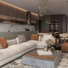 A closer view of the living area, showing the plush sectional sofa, marble coffee table, and the integrated kitchen in the background. The design is all about creating a comfortable yet sophisticated environment for relaxing and socializing.