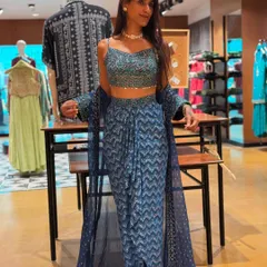 Here I am trying on a modern ethnic co-ord set. I love showing my clients how to play with contemporary silhouettes, like these draped pants and crop top, to keep their traditional wear feeling fresh and trendy.